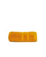 The One Handdoek Ultra Deluxe 50 x 100 cm 675 gr Honey Yellow