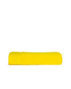 The One Badhanddoek 450 gram 70x140 Geel